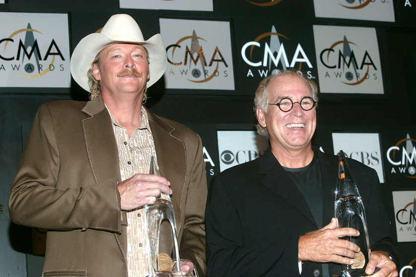 Singer Alan Jackson and Jimmy Buffet winners of the "Vocal Event of the Year" pose backstage at the "37th Annual CMA Awards" at the Grand Ole Opry House November 5, 2003 in Nashville, Tennessee