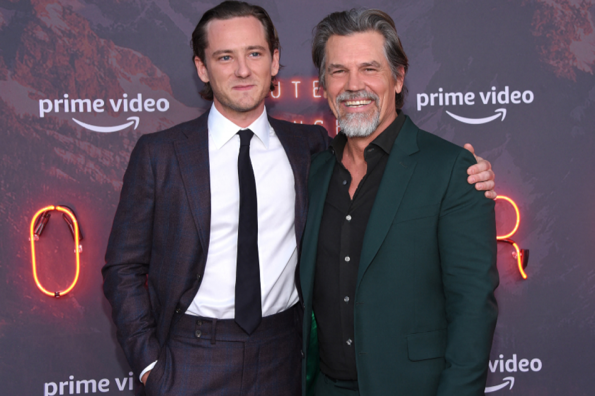 US actors Josh Brolin (R) and Lewis Pullman (L) attend the Prime Video "Outer Range" premiere at the Harmony Gold Theater in Hollywood, California, on April 7, 2022