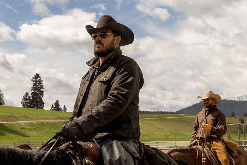 Cole Hauser rides a horse in a scene from 'Yellowstone'