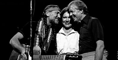 Former President Jimmy Carter with Former First Lady Rosalynn join Willie Nelson and perform at The Omni Coliseum in Atlanta Georgia. December 12, 1982
