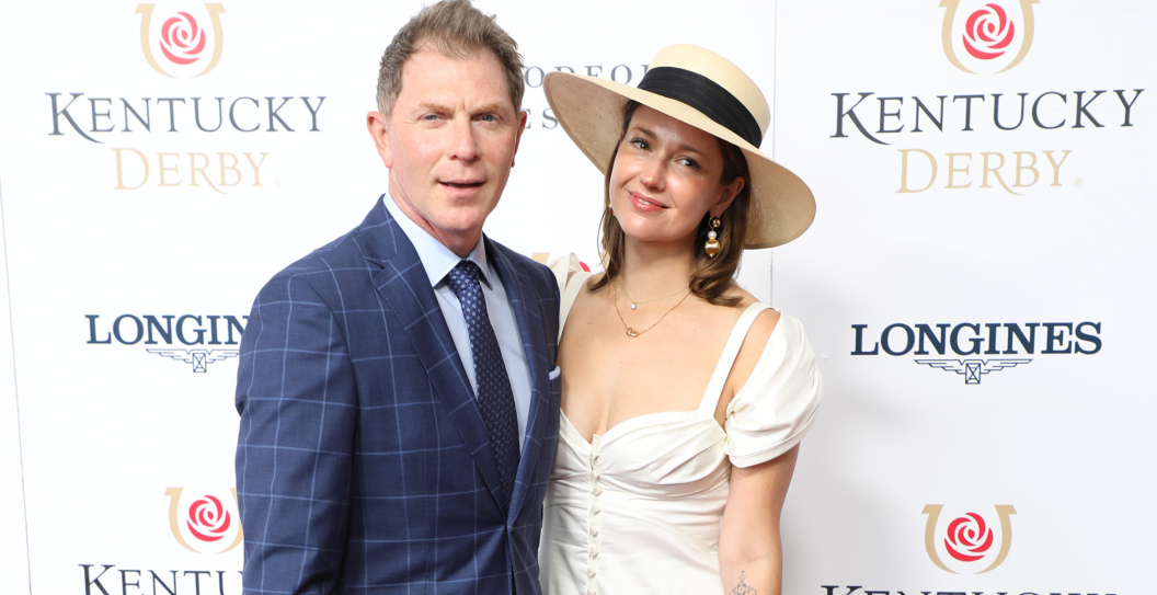 Celebrity chef Bobby Flay and Christina Perez walk the red carpet at the 148th Kentucky Derby on May 07, 2022, at Churchill Downs in Louisville, KY.