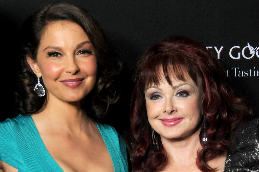 Actress Ashley Judd (L) and singer Naomi Judd arrive at the Los Angeles premiere of "Olympus Has Fallen" held at ArcLight Cinemas Cinerama Dome on March 18, 2013 in Hollywood, California. (Photo by Barry King/FilmMagic)