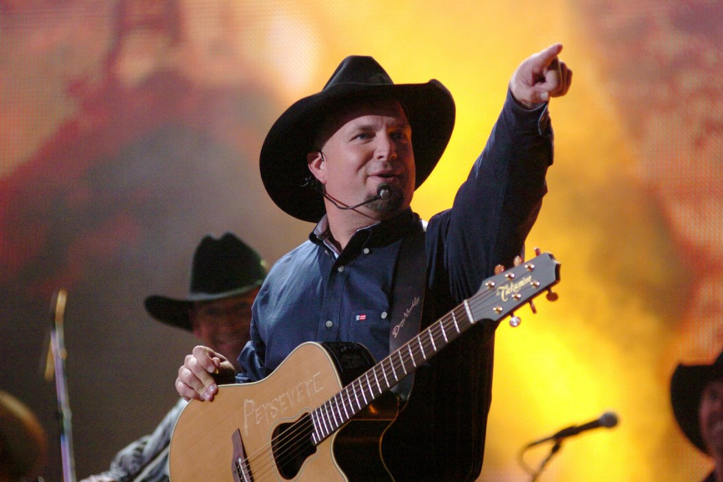Garth Brooks performs "Good Ride Cowboy" during The 39th Annual CMA Awards - Garth Brooks Performs in Times Square at Times Square in New York City, New York, United States.