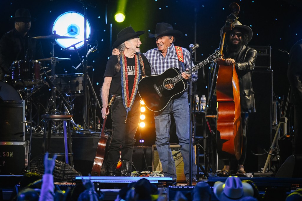 Willie Nelson and George Strait perform during "Willie: Life And Songs Of An American Outlaw" at Bridgestone Arena on January 12, 2019 in Nashville, Tennessee. 