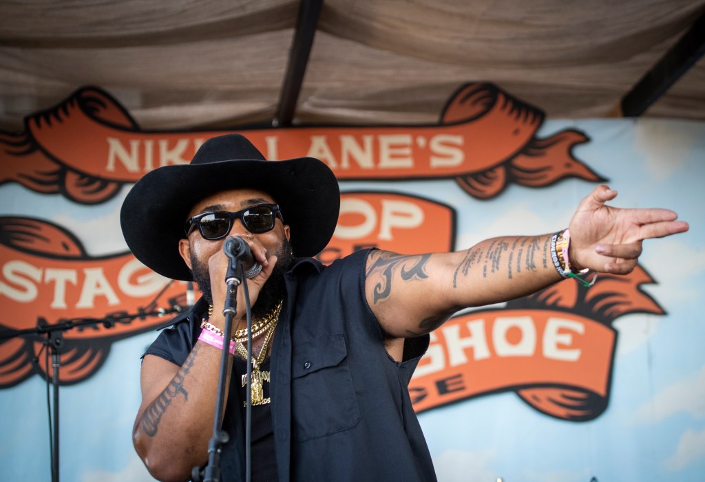 Randy Savvy, Compton Cowboys founder, rapper, cowboy and community activist, performs at Nikki Lanes Stage Stop Marketplace on the second day of the three-day Stagecoach Country Music Festival at Empire Polo Fields, Indio, CA on Saturday, April 30, 2022.