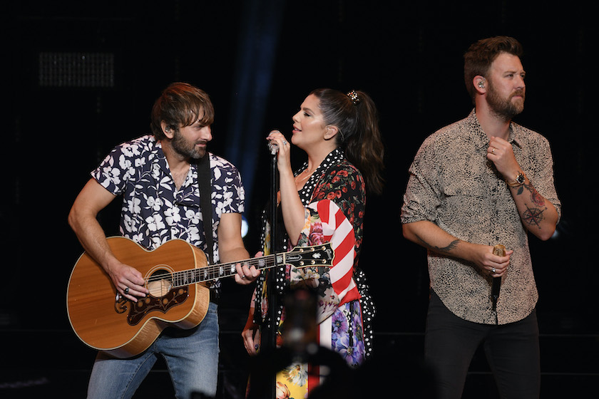 WANTAGH, NEW YORK - JULY 30: (L-R) Musicians Dave Haywood, Hillary Scott and Charles Kelley of Lady A perform onstage during "What a Song Can Do" tour at Northwell Health at Jones Beach Theater on July 30, 2021 in Wantagh, New York. 