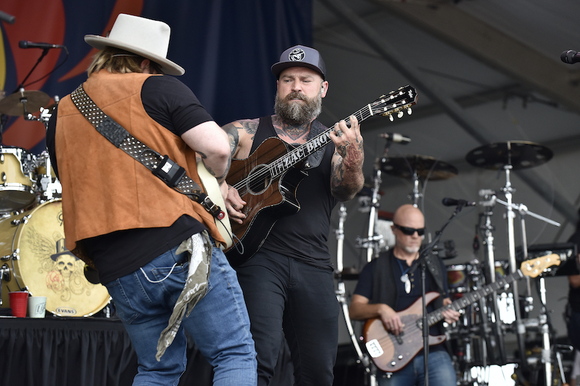 NEW ORLEANS, LOUISIANA - MAY 08: Coy Boyles (L) and Zac Brown of the Zac Brown Band perform during the 2022 New Orleans & Jazz festival at Fair Grounds Race Course on May 08, 2022 in New Orleans, Louisiana.