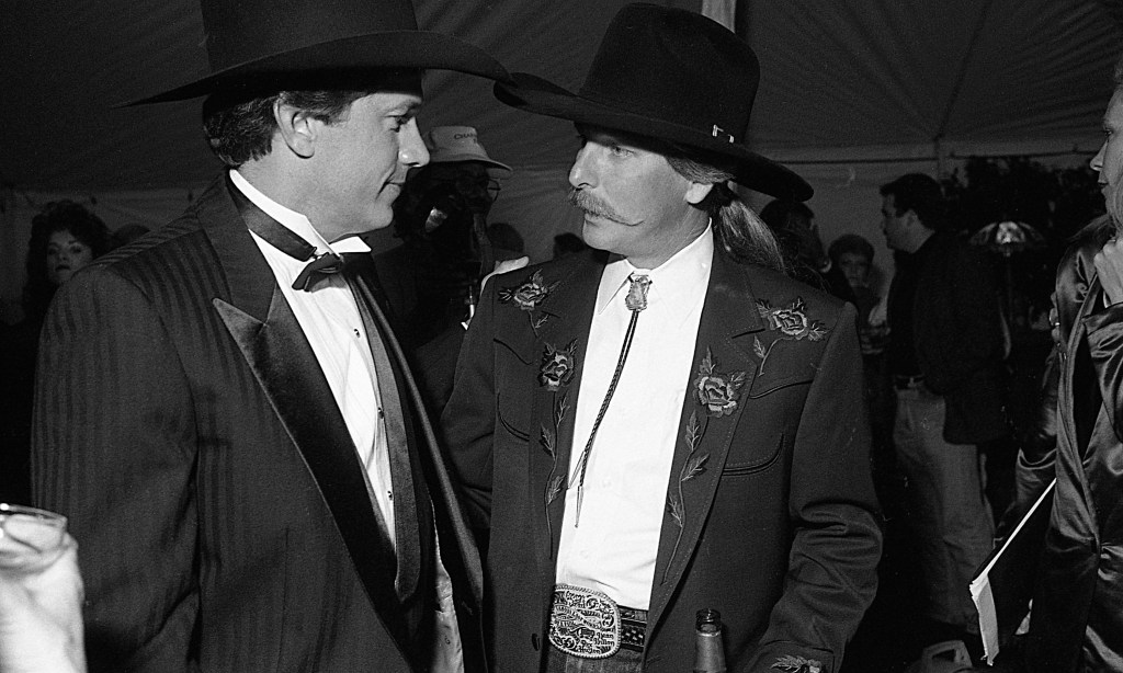 Country Music Singer George Strait with Country Music Songwriter Dean Dillon at Party for George Strait Movie premiere on October 20, 1992 in Nashville, Tennessee