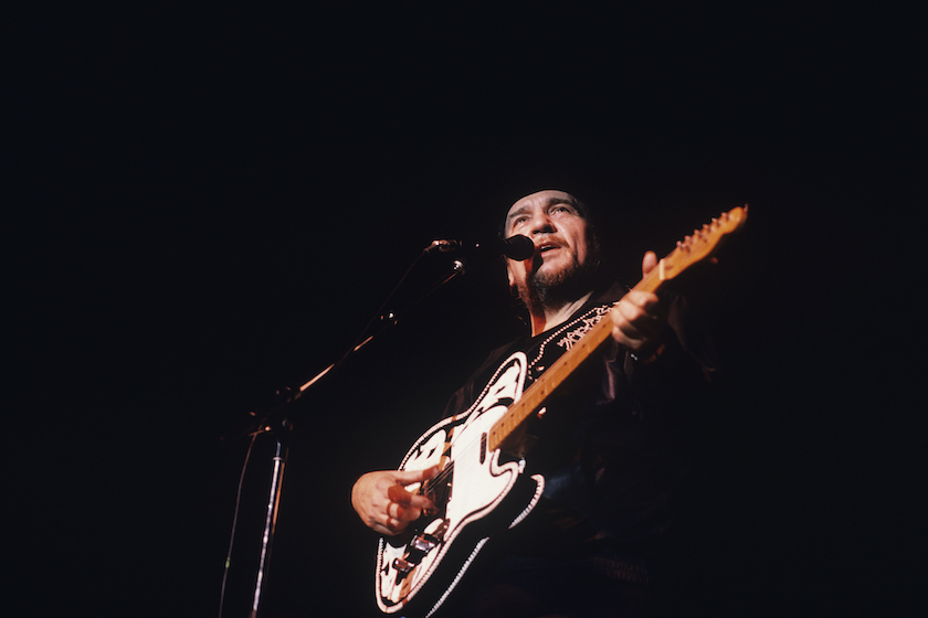 LONDON, UNITED KINGDOM - APRIL 01: Waylon Jennings performs on stage at the Country Music Festival held at Wembley Arena, London in April 1981. 