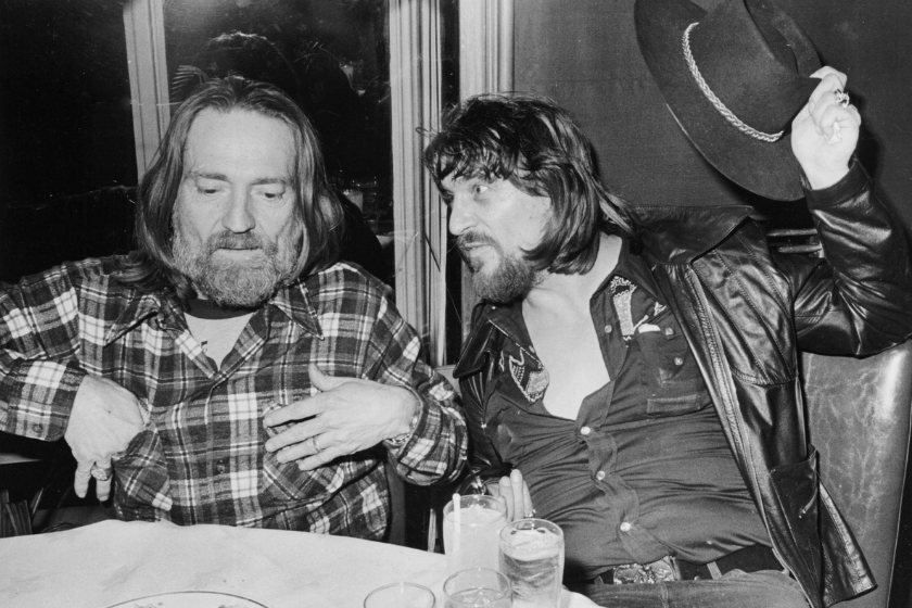 Musicians Willie Nelson, left, and Waylon Jennings, right, at a party at the Rainbow Room in Manhattan on January 16, 1978