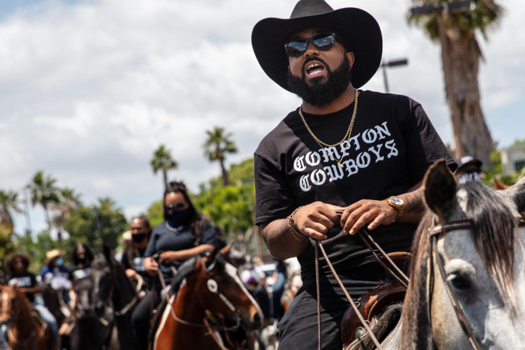 The Compton Cowboys, with Randy Savvy riding lead, prepare to leave Gateway Towne Center, for the start of their Peace Ride, culminating at Compton City Hall, on Sunday, June 7, 2020.