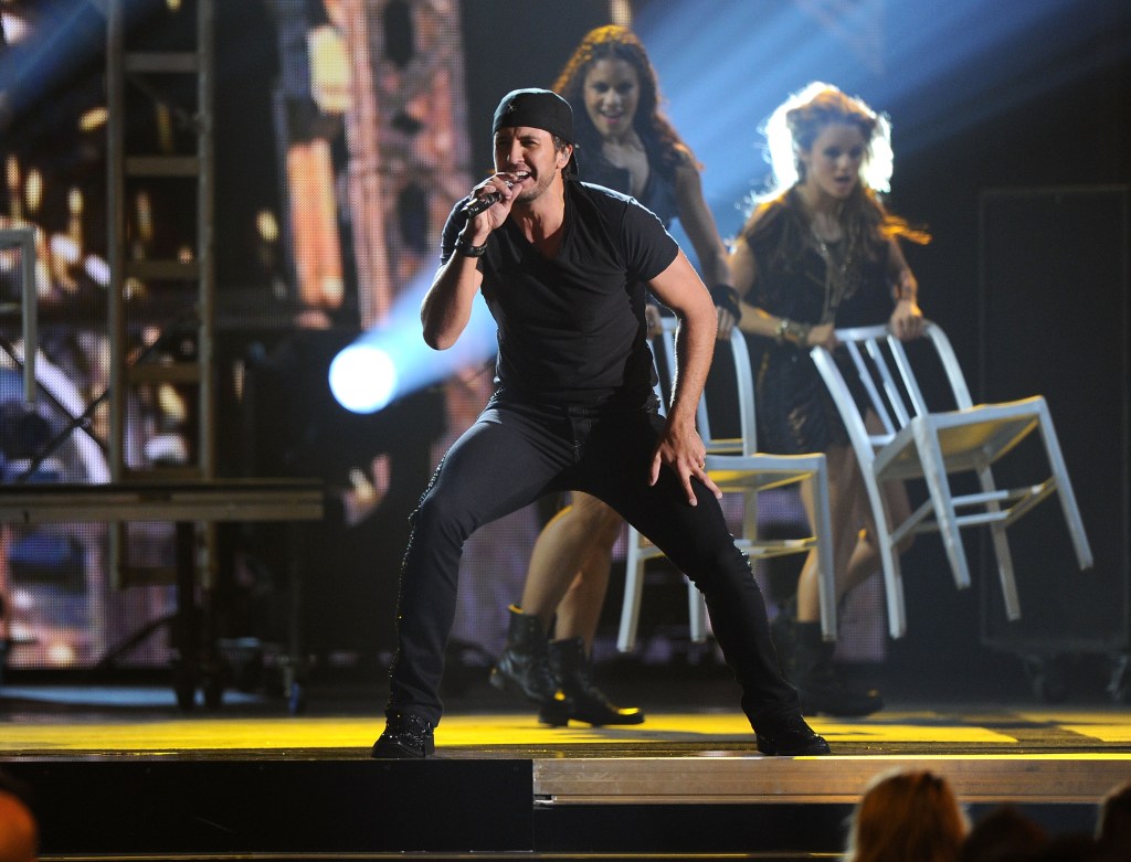  Luke Bryan performs onstage at the 45th annual CMA Awards at the Bridgestone Arena on November 9, 2011 in Nashville, Tennessee.