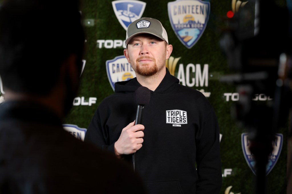 Scotty McCreery attends ACM Lifting Lives Topgolf Tee-Off & Rock On at Topgolf Las Vegas on March 06, 2022 in Las Vegas, Nevada.