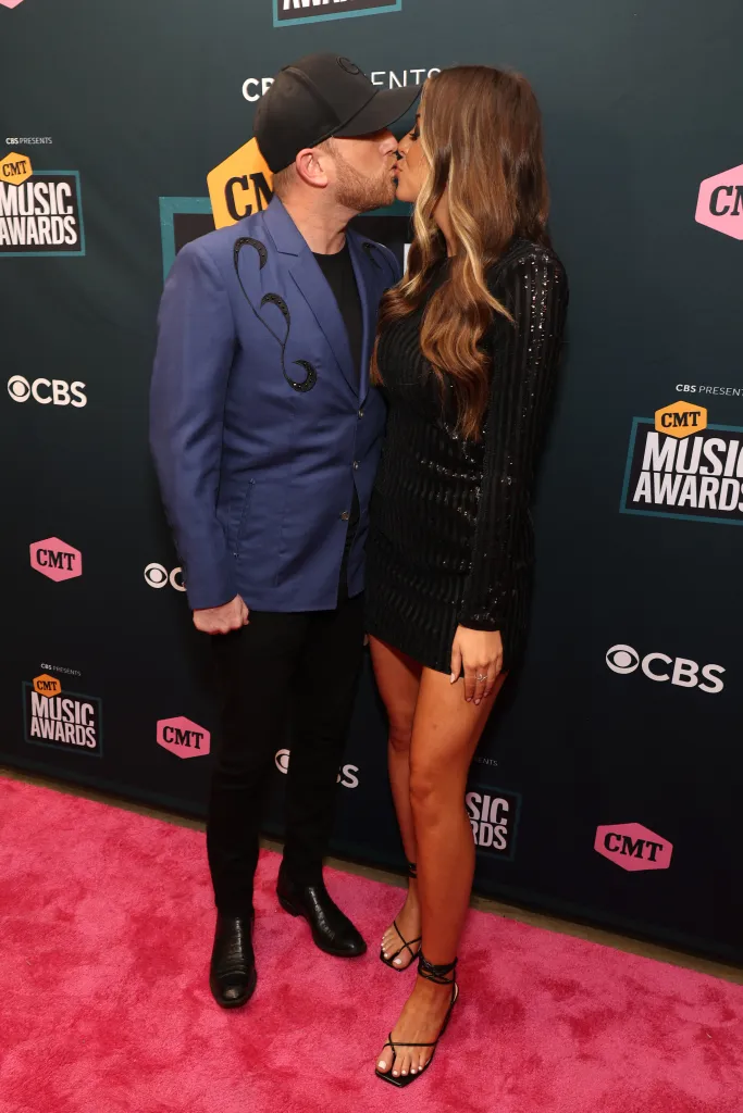 Cole Swindell and Courtney Little attend the 2022 CMT Music Awards at Nashville Municipal Auditorium on April 11, 2022 in Nashville, Tennessee. 