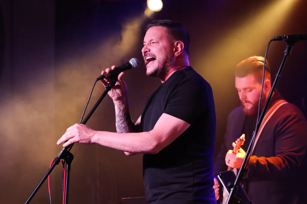 NASHVILLE, TENNESSEE - MAY 10: Ty Herndon performs on stage during a Music Memorial for Jeff Carson at Nashville Palace on May 10, 2022 in Nashville, Tennessee. 