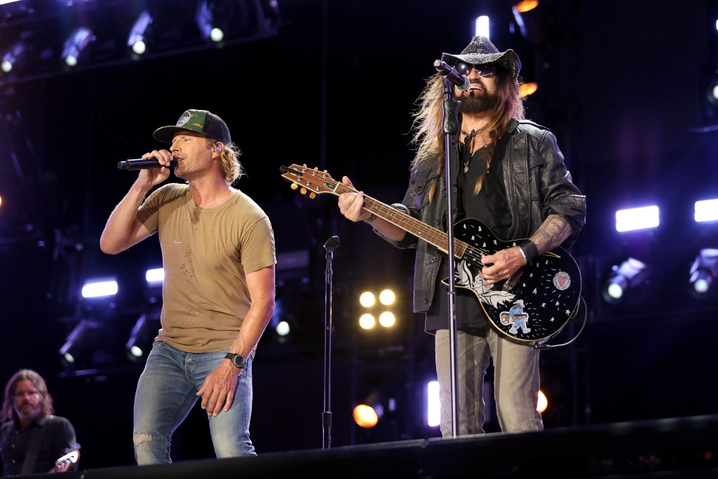Dierks Bentley and Billy Ray Cyrus perform during day 4 of CMA Fest 2022 at Nissan Stadium on June 12, 2022 in Nashville, Tennessee.