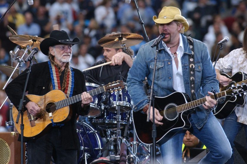 Willie Nelson and Toby Keith during Super Bowl XXXVIII Pre-Game Show at Reliant Stadium in Houston, Texas, United States.