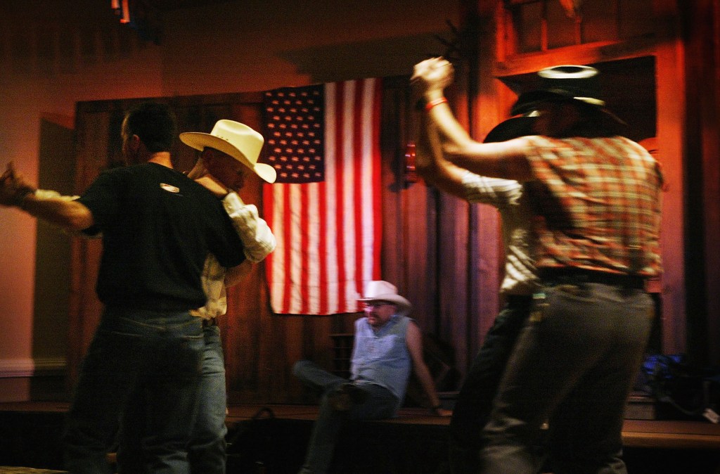  Cowboys dance with one another on the eve of the gay-oriented 16th Annual San Diego Rodeo on September 17, 2004 in Del Mar, California. The San Diego Rodeo is put on by the Golden State Gay Rodeo Association (GSGRA), one of four founding associations of the International Gay Rodeo Association (IGRS). This is the 20th IGRA-sanctioned gay rodeo season in California. 