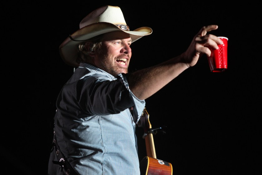 Toby Keith toasts his fans with a red solo cup, the name of one of his hit songs on the Mane Stage during the first day of the Stagecoach Country Music Festival at the Indio Polo Fields on the first day, Friday, April 26, 2013.