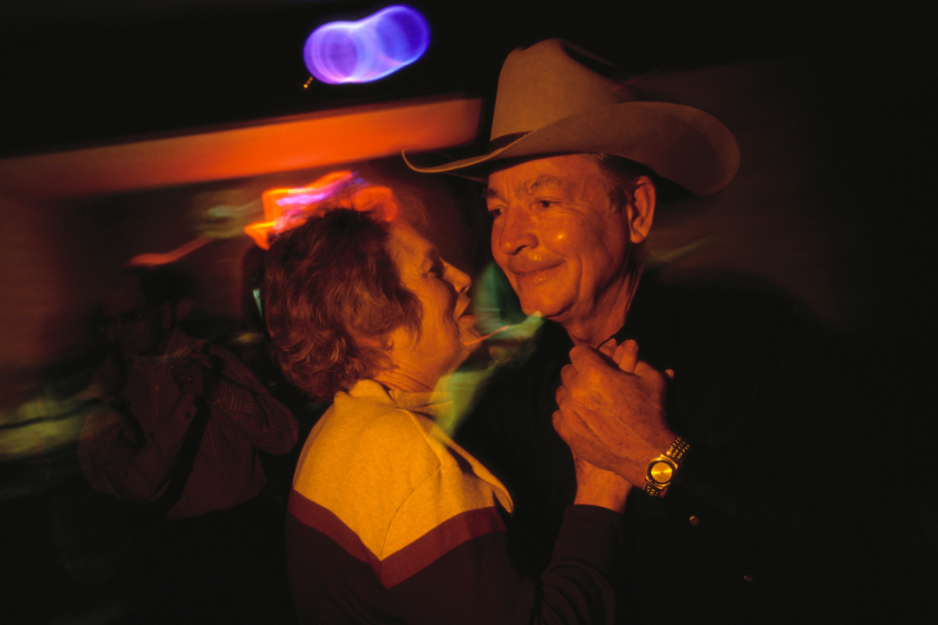A couple dances to the band Southern Image. The two are attending a Sunday night dance at the Veteran's of Foreign Wars (VFW) hall in Fredricksburg, Texas.