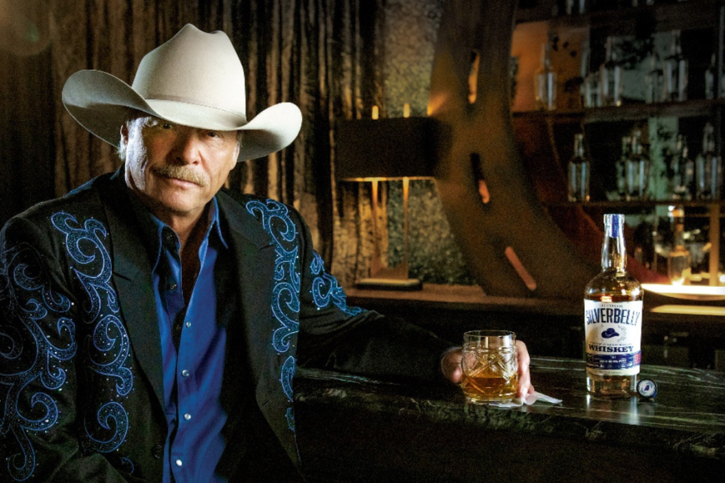 Alan Jackson poses with his signature whiskey