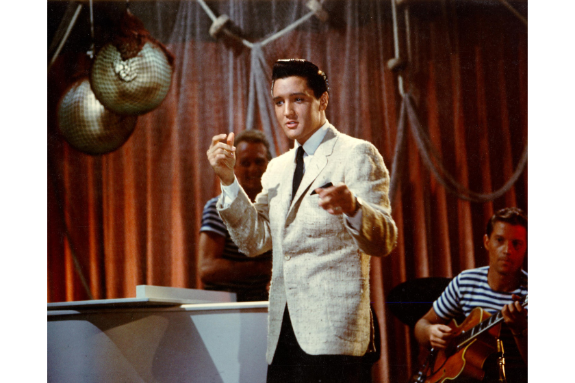 Rock and roll singer Elvis Presley performs in the film "Girls Girls Girls" at Paramount Studios in April of 1962 in Los Angeles, California