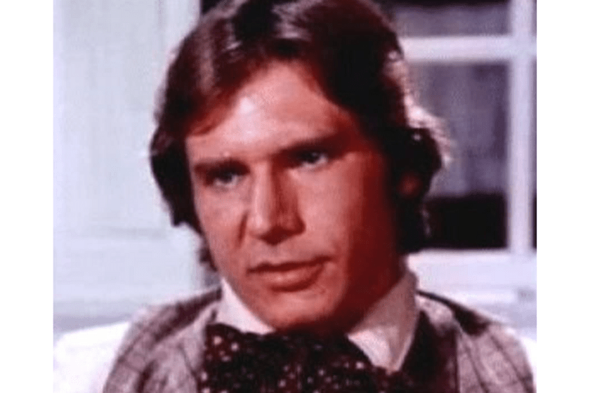 Harrison Ford wearing a tie in a scene from 'Dynasty'