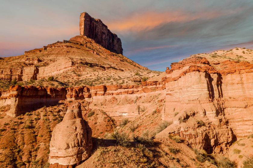 Majestic Pallisade Butte in Gateway Colorado with a beautiful sunset overhead