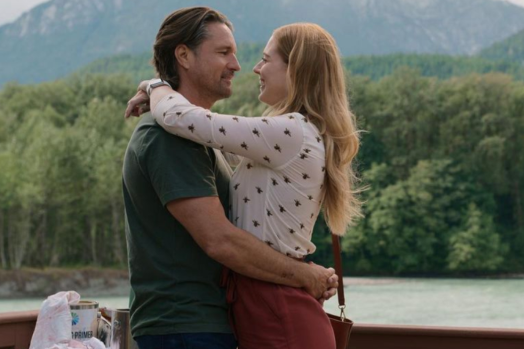 Alexandra Breckenridge and Martin Henderson embrace in a scene from Netflix series 'Virgin River'