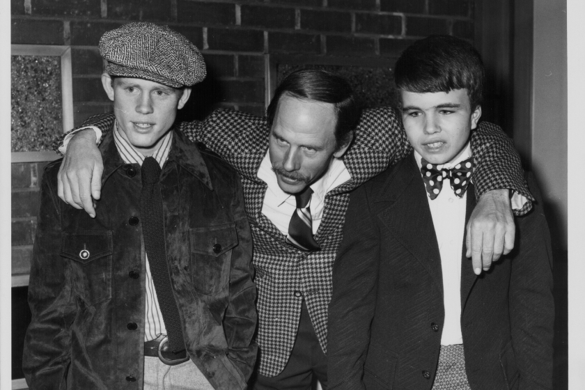 Actor Rance Howard with his arms around his sons Ron and Clint, also actors, at a screening of the movie 'Where the Lilies Bloom', at the Screen Directors Guild, Hollywood, February 1974