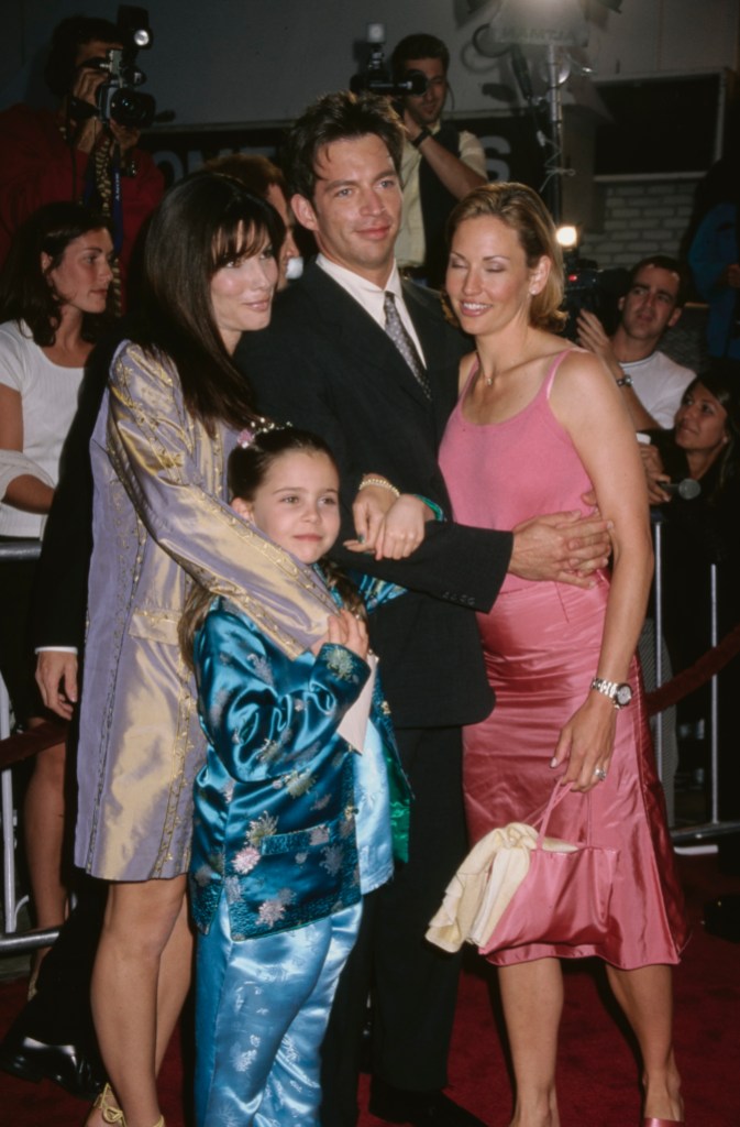 American actress Sandra Bullock, American actress Mae Whitman, American singer, actor and pianist Harry Connick Jr, and his wife, American actress Jill Goodacre attend the Westwood premiere of 'Hope Floats,' held at the Mann Village Theater in Los Angeles, California, 27th May 1998. 