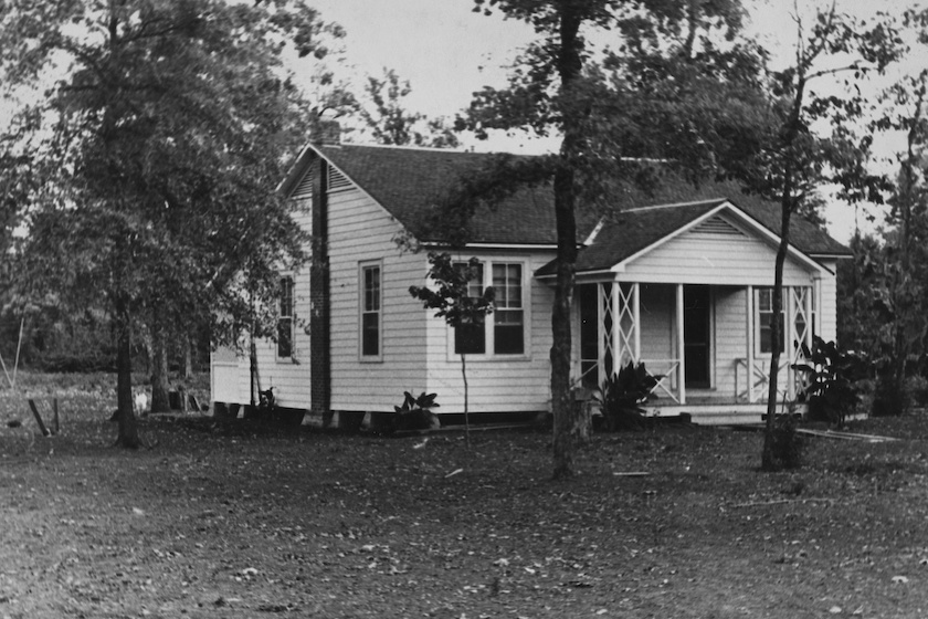 Black and white photograph of a house in Dyess Colony, one of the most famous 