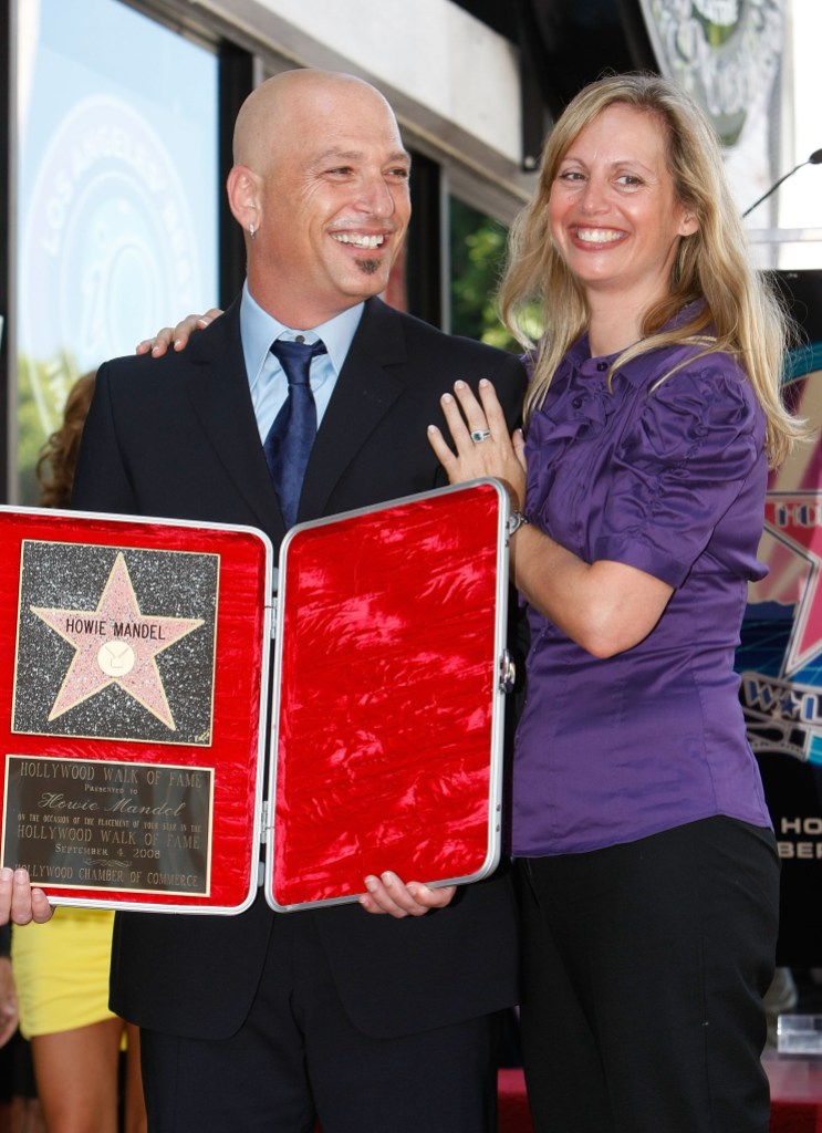 LOS ANGELES - SEPTEMBER 04: Comedian Howie Mandel and wife Terry Soil pose with Mandel's star on the Hollywood Walk of Fame on September 4, 2008 in Los Angeles, California. 