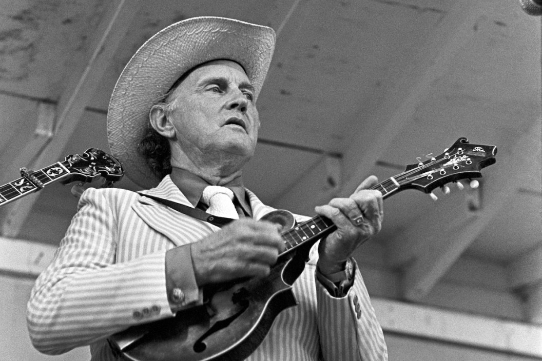 LAVONIA, GA - JULY 28: Mandolinist and singer Bill Monroe, often called The Father of Bluegrass, performs with his band The Bluegrass Boys at the Lavonia Bluegrass Festival at Shoal Creek Country Music Park on July 28, 1973 in Lavonia, Georgia.