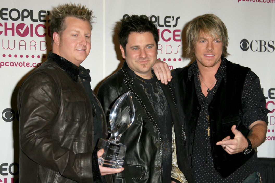 Musicians Gary LeVox, Jay DeMarcus and Joe Don Rooney of the band Rascal Flatts, winners of the "Favorite Song from a Movie" award (for "Life is a Highway" from Cars) pose in the press room during the 33rd Annual People's Choice Awards held at the Shrine Auditorium on January 9, 2007 in Los Angeles, California