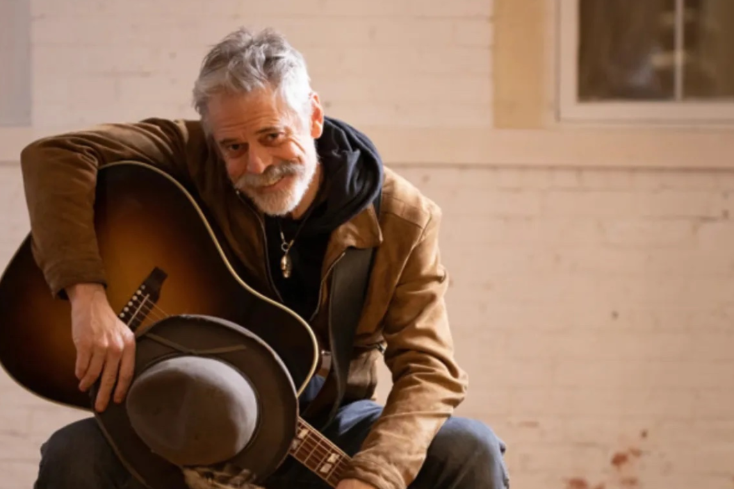Tommy Howell poses with guitar