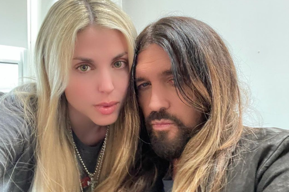 Billy Ray Cyrus poses with singer-songwriter Firerose