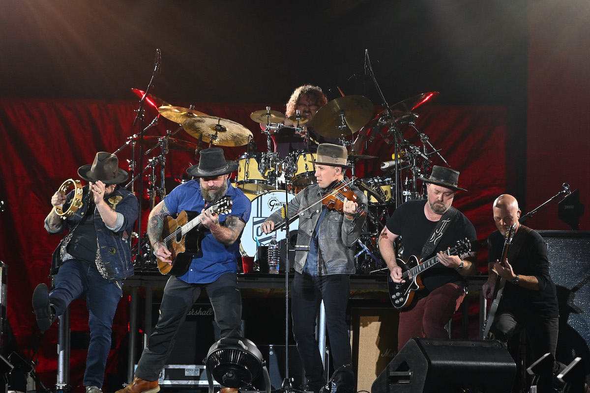 ATLANTA, GEORGIA - NOVEMBER 11: The Zac Brown Band perform onstage at Mercedes-Benz Stadium on November 11, 2021 in Atlanta, Georgia.