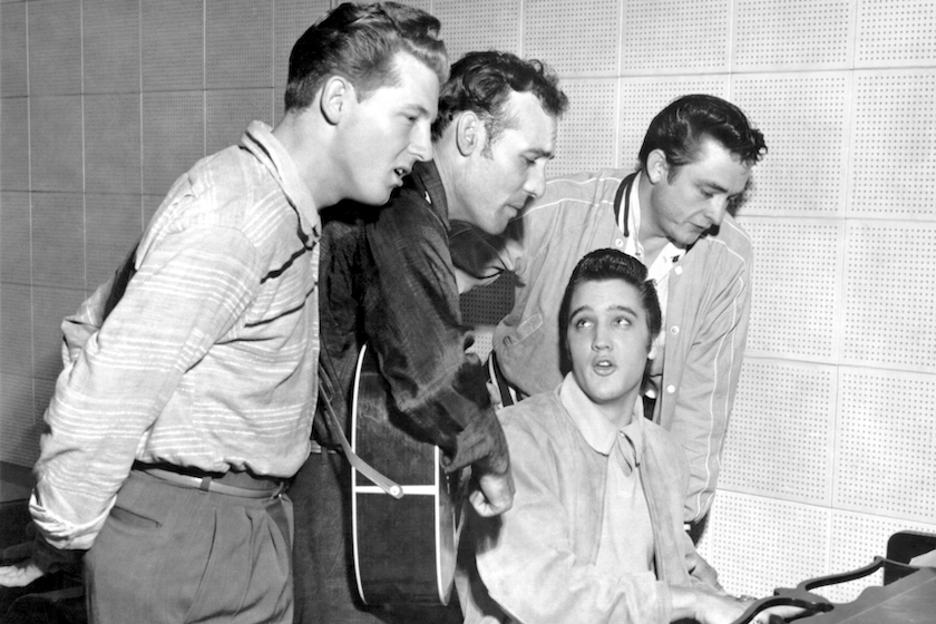 MEMPHIS, TN - DECEMBER 04: Rock and roll musicians Jerry Lee Lewis, Carl Perkins, Elvis Presley and Johnny Cash as "The Million Dollar Quartet" December 4, 1956 in Memphis, Tennessee. This was a one night jam session at Sun Studios. 