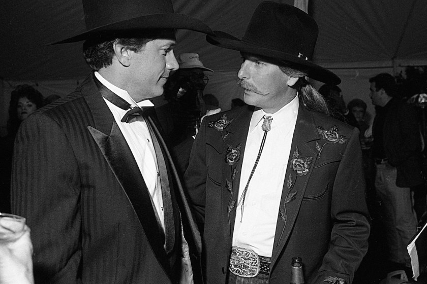 NASHVILLE - OCTOBER 20: Country Music Singer George Strait with Country Music Songwriter Dean Dillon at Party for George Strait Movie premiere on October 20, 1992 in Nashville, Tennessee
