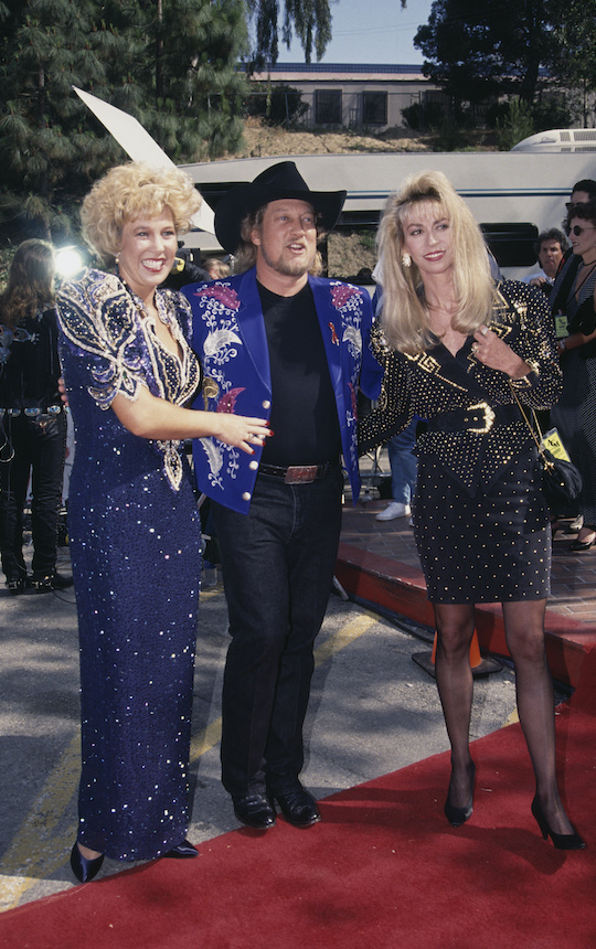 American country musician John Anderson with his wife and Sandy Mahl attend the 30th Annual Academy of Country Music Awards at Universal Amphitheatre in Universal City, California, United States,10th May, 1995. 