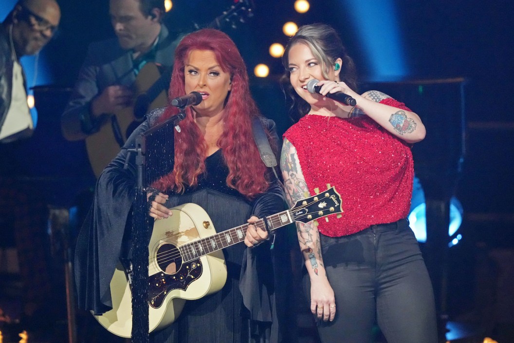 Wynonna Judd and Ashley McBryde perform onstage. at The Judds: "Love Is Alive" The Final Concert held at Murphy Center on November 3, 2022 in Murfreesboro, Tennessee.
