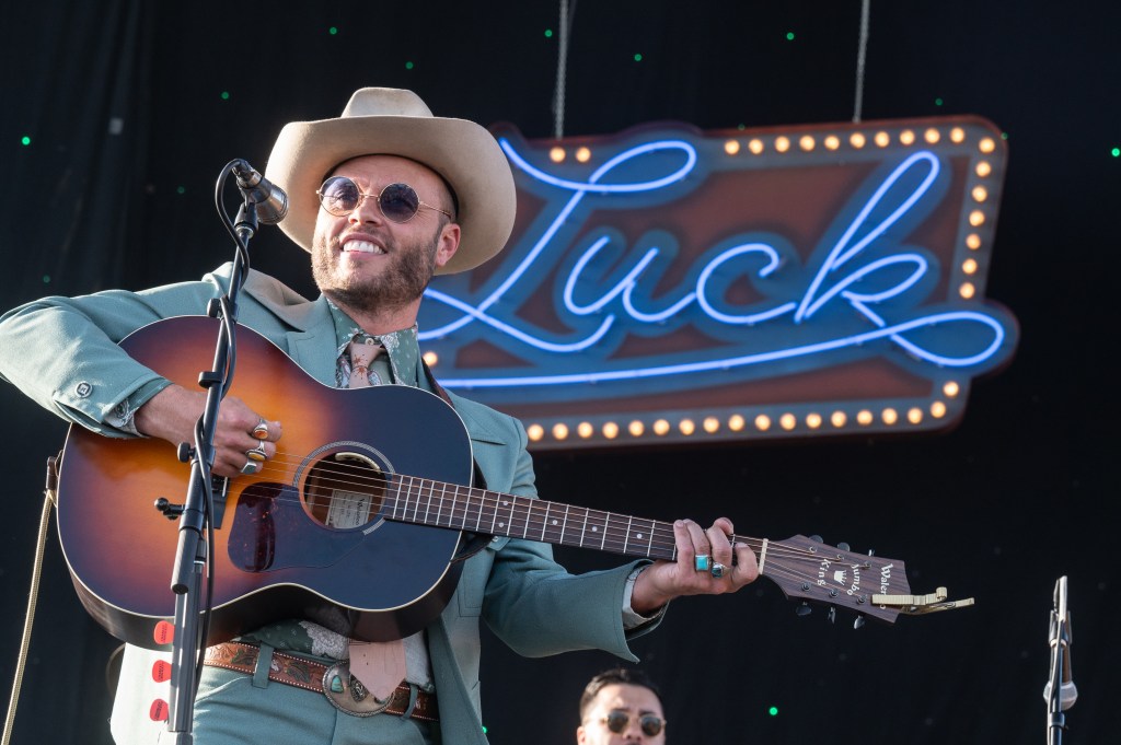LUCK, TEXAS - MARCH 17: Singer, songwriter and guitarist Charley Crockett performs live on stage during the Luck Reunion on March 17, 2022 in Luck, Texas. 