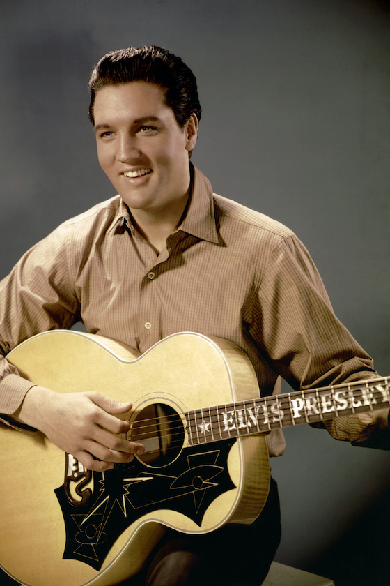 American actor and singer Elvis Presley promoting the movie Wild in the Country, directed by Philip Dunne.