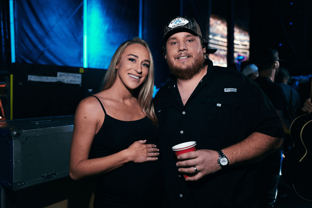 Nicole Hocking and Luke Combs attend day 3 of The 49th CMA Fest at Nissan Stadium on June 11, 2022 in Nashville, Tennessee.