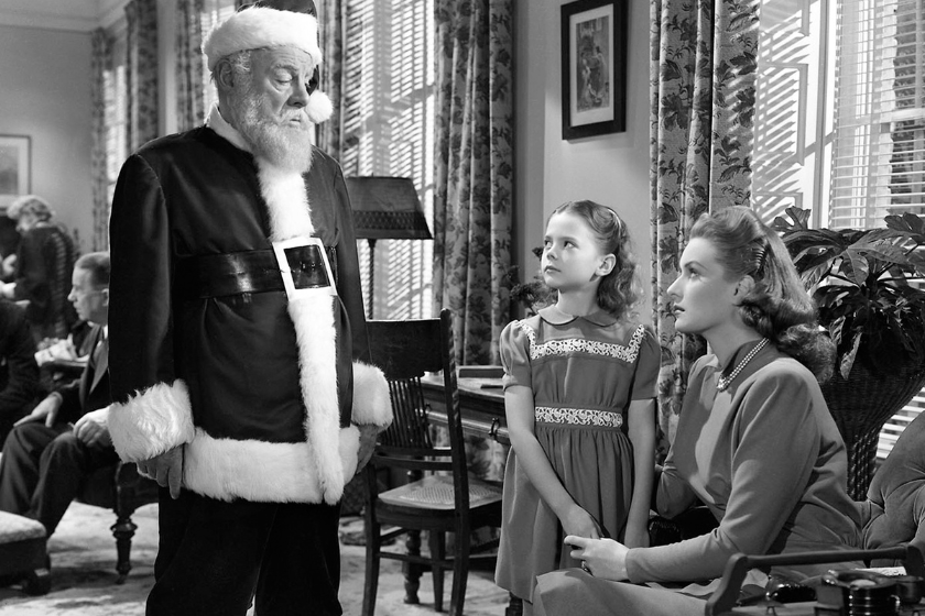 Edmund Gwenn (1877 - 1959) as Kris Kringle, Natalie Wood (1938 - 1981) as Susan Walker and Maureen O'Hara as Doris Walker in 'Miracle On 34th Street', written and directed by George Seaton, 1947