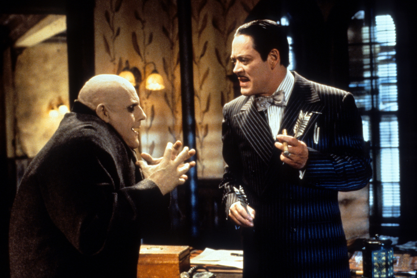 Christopher Lloyd and Raul Julia talking in a scene from the film 'Addams Family Values', 1993