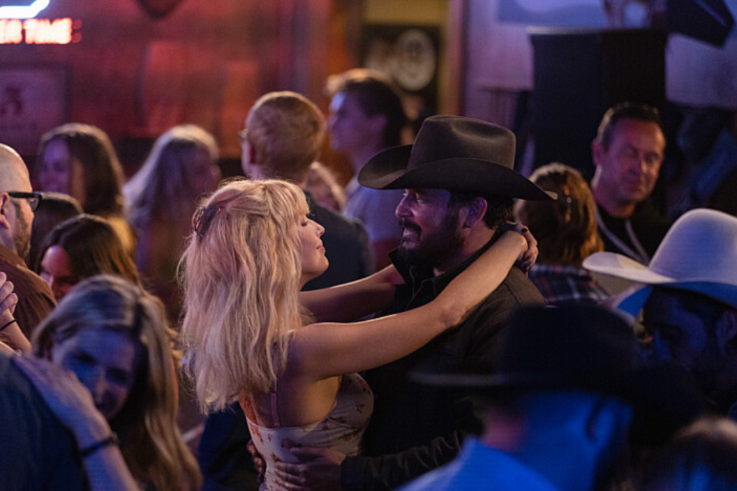 Beth Dutton and Rip Wheeler dance in a bar in a scene from 'Yellowstone' season 5 episode 3