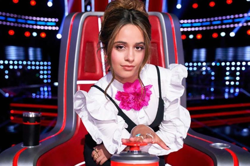 Camila Cabello poses in her chair on The Voice