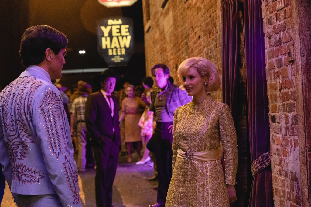 (L-R): Michael Shannon as George Jones and Jessica Chastain as Tammy Wynette in GEORGE & TAMMY, The Race Is On". 